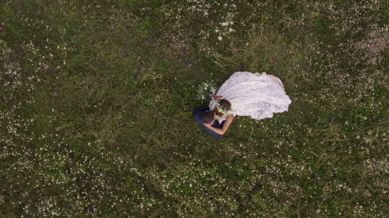Aerial wedding film moment